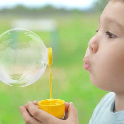 Pediatric Articulation delay treatment of children through speech therapy that includes bubble blowing